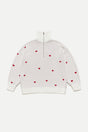 White jacquard half-zip sweater