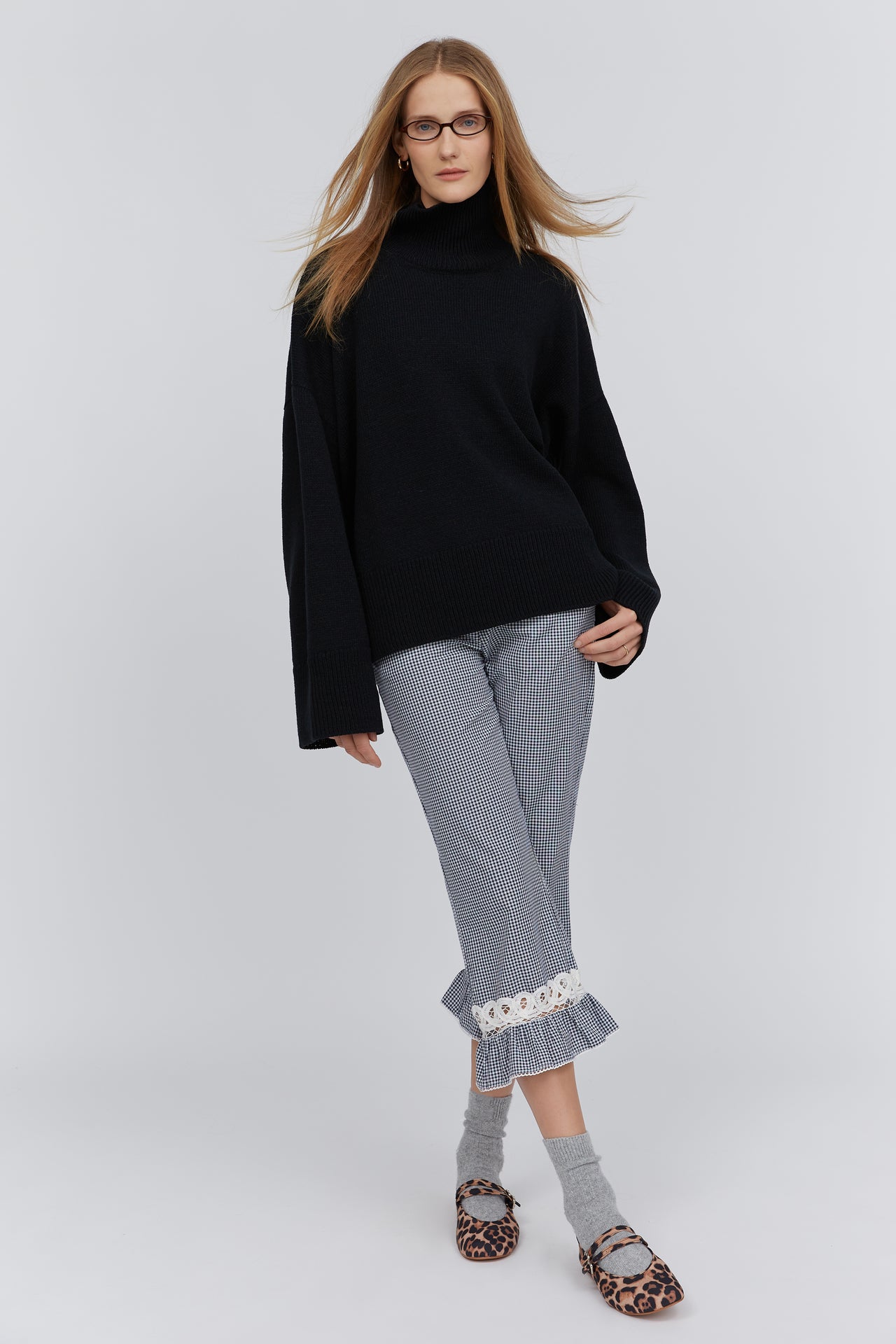 Black merino wool turtleneck sweater